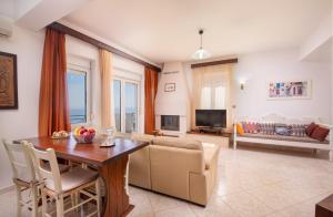Μια τηλεόραση ή/και κέντρο ψυχαγωγίας στο Aptera Dream Apartment