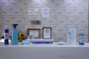 a white counter with hygiene products on it at Hotel Grace Premium Bhubaneswar in Bhubaneshwar
