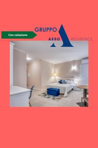 a room with a bed and a table at Asso Residence Ospedale in Terni