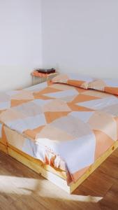 Postel nebo postele na pokoji v ubytování Joie Home