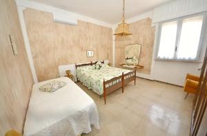 Posteľ alebo postele v izbe v ubytovaní Villetta Luce Salento