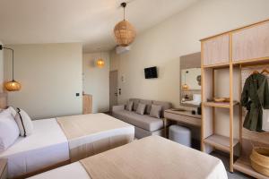 Posteľ alebo postele v izbe v ubytovaní Castaway Suites - Studios Christos