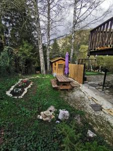 Zahrada ubytování L'Orée, appartement cosy, 4 à 6 pers