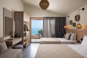 Posteľ alebo postele v izbe v ubytovaní Castaway Suites - Studios Christos