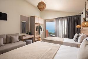 Posteľ alebo postele v izbe v ubytovaní Castaway Suites - Studios Christos