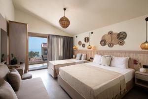 Posteľ alebo postele v izbe v ubytovaní Castaway Suites - Studios Christos