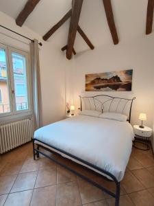 Katil atau katil-katil dalam bilik di Int 4 - Suite Edoardo by Residence San Luca