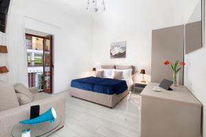Ένα ή περισσότερα κρεβάτια σε δωμάτιο στο YourHome - Jolly Aranci
