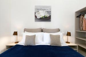 Ένα ή περισσότερα κρεβάτια σε δωμάτιο στο YourHome - Jolly Aranci