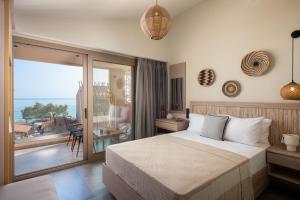 Posteľ alebo postele v izbe v ubytovaní Castaway Suites - Studios Christos
