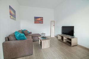 A television and/or entertainment centre at Basiliki's Apartments