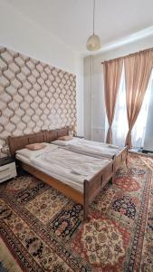 Кровать или кровати в номере Kamil Apartments, Premium