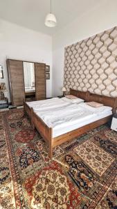 Кровать или кровати в номере Kamil Apartments, Premium