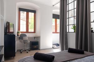 TV a/nebo společenská místnost v ubytování Il camino