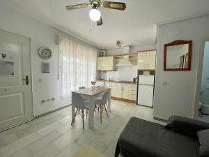 Kuchyň nebo kuchyňský kout v ubytování Apartamento Columela + 18 fotografií