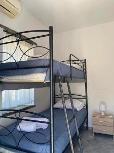 Poschodová posteľ alebo postele v izbe v ubytovaní SEAVIEW UP