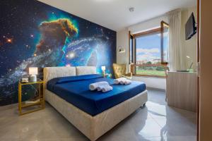 Ένα ή περισσότερα κρεβάτια σε δωμάτιο στο Galaxy Room Sardinia