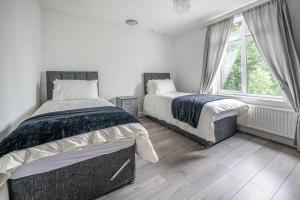 Postel nebo postele na pokoji v ubytování Spacious Worcester City Centre House