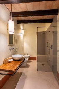a bathroom with a sink and a toilet and a shower at Case Zucchi Bioagriturismo in Castelnuovo Fogliani