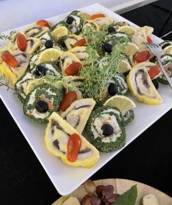 a plate of food with different types of food at Sosnowe Zacisze Barszczewo in Choroszcz