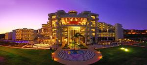 a large building with a fountain in front of it at Elysium Resort & Spa in Faliraki