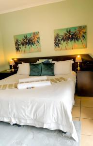 Ένα ή περισσότερα κρεβάτια σε δωμάτιο στο Oasis Of Life Guest House +31 φωτογραφίες