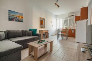A kitchen or kitchenette at Basiliki's Apartments