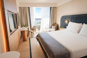 Кровать или кровати в номере Hotel Croatia
