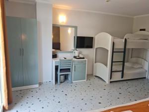 Kuchyň nebo kuchyňský kout v ubytování Tonoz Beach Hotel