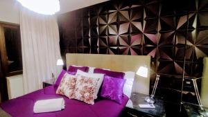 Voodi või voodid majutusasutuse Hotel GRAND M-RCURE Itaim BiBi - Black Edition - Master Deluxe Duplex - King Studio Veranda - Dream Theater - By LuXXoR toas