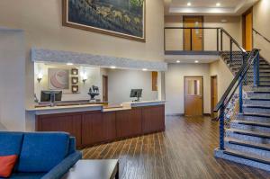 a lobby of a hospital with a waiting area and stairs at Comfort Inn Bozeman near University in Bozeman