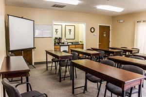 a classroom with tables and chairs and a whiteboard at Quality Inn Kinston Hwy 70 in Kinston