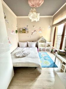 Posteľ alebo postele v izbe v ubytovaní Apartament Kamień i Morze