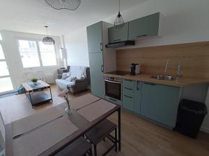 Photo de la galerie de l'établissement L'olivier Maison de ville proche Cabourg, à Dozulé