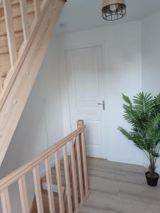 Photo de la galerie de l'établissement L'olivier Maison de ville proche Cabourg, à Dozulé 2 autres photos