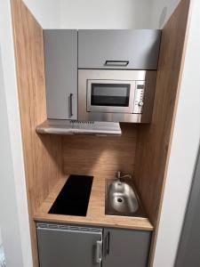 Kuchyň nebo kuchyňský kout v ubytování Firstsleep Ebersberg