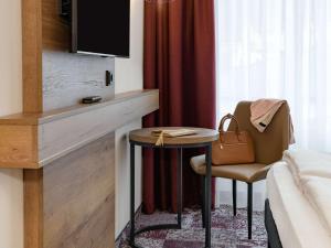 TV a/nebo společenská místnost v ubytování ibis Styles Coburg