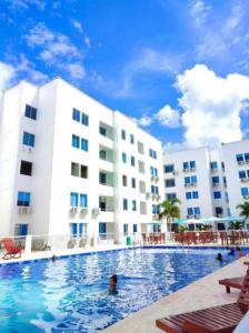 Apartamento en Coveñas con piscina tesisinde veya buraya yakın yüzme havuzu