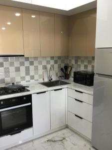 Dapur atau dapur kecil di Квартира +10 gambar