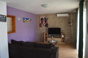 TV a/nebo společenská místnost v ubytování Apartman Didi