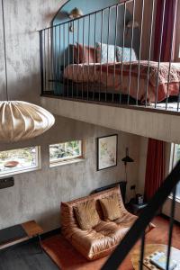 a living room with a couch and a bunk bed at E. Gray house in Dungarvan