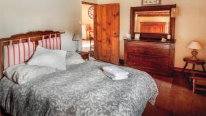 Een bed of bedden in een kamer bij Maison Landaise