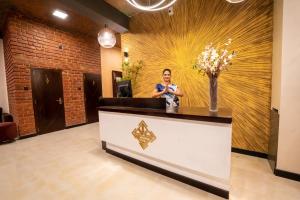 Členové personálu v ubytování Limeshine - Airport Transit Hotels & Residences