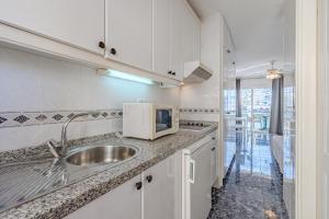 Kuchnia lub aneks kuchenny w obiekcie Apartamentos en Torres del Sol