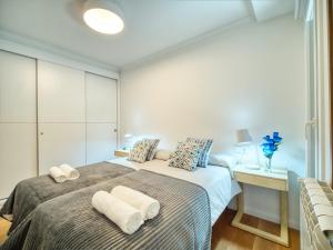 Postel nebo postele na pokoji v ubytování Amara Prime San Sebastian + 20 fotografií