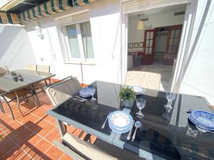 A balcony or terrace at MAGNÍFICO ÁTICO PLENO CENTRO. Terraza 60m. Climatizado, Garaje