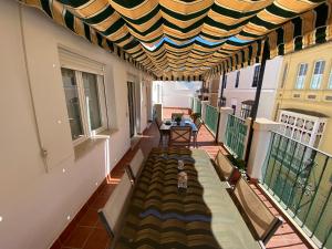A seating area at MAGNÍFICO ÁTICO PLENO CENTRO. Terraza 60m. Climatizado, Garaje