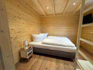 Postel nebo postele na pokoji v ubytování Hotel Hochfirst