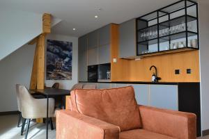 Kuchyň nebo kuchyňský kout v ubytování Andenes Suitehotel