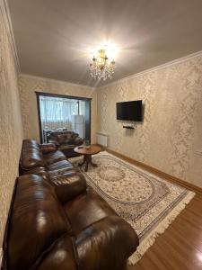 Гостиная зона в Your cozy apartment "Centro Parkside" in the City center